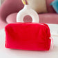 red pouch bag